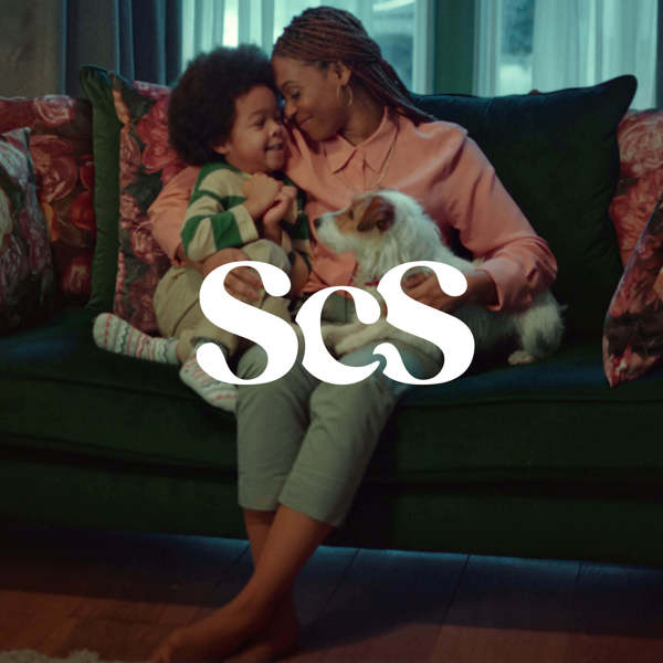 SCS logo} SCS Logo With Family On Sofa