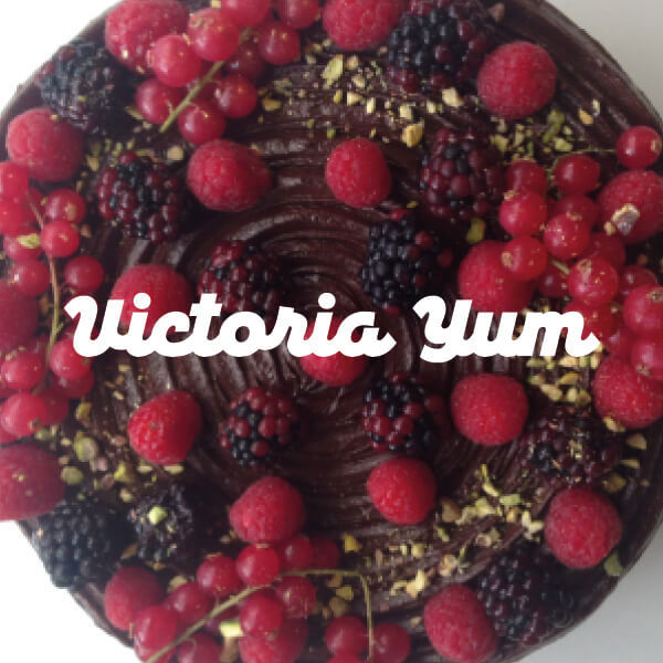 Victoria Yum logo} Victoria Yum Logo On A Cake Background