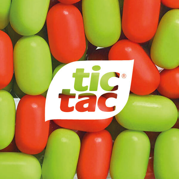 Tic Tac logo} Tic Tac Logo On A Background Of Sweets