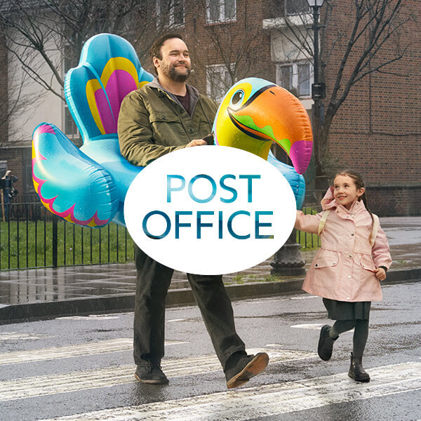 Post Office logo} Post Office Logo With A Man Wearing An Inflatable Tocan And A Little Girl